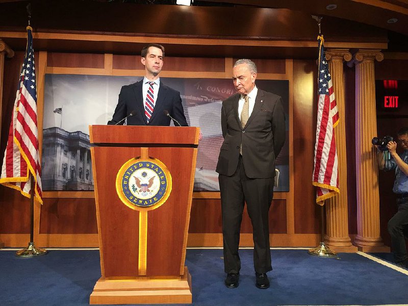 Sen. Tom Cotton (left) and Senate Minority Leader Charles Schumer hold a news conference Thursday in Washington on their bill aimed against fentanyl. 