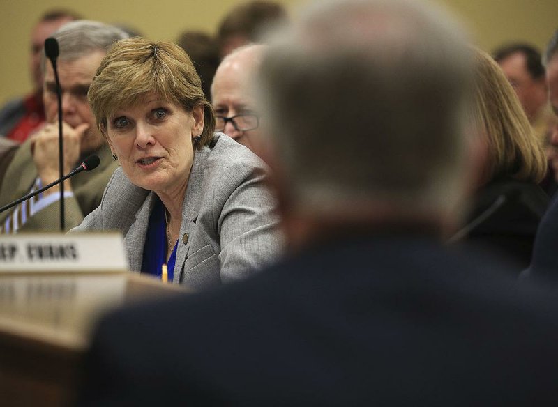 Rep. LeAnne Burch, D-Monticello, questions Rep. Ken Bragg about the school voucher bill he was sponsoring in the House during action Thursday in the House Education Committee. 