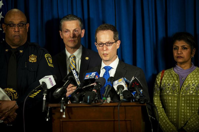 U.S. Attorney Benjamin Glassman answers questions during a news conference regarding ex-convict Brian Rini, 23, at the U.S. Attorney’s office in downtown Cincinnati on Friday. 