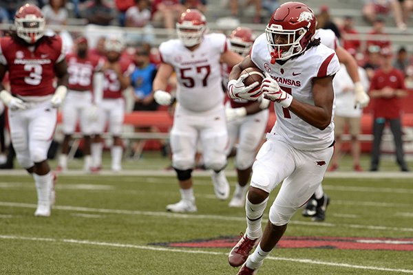 Arkansas receiver Trey Knox carries the ball into the end zone Saturday, April 6, 2019, during the Razorbacks' spring game in Razorback Stadium in Fayetteville