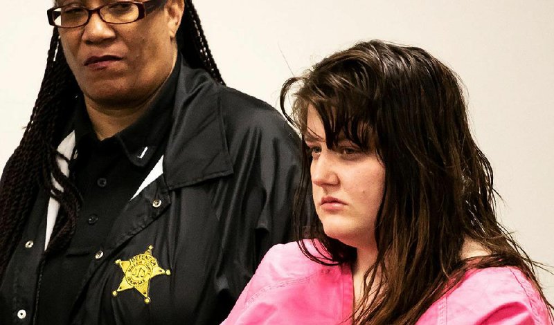 McKenna Belcher, 27, stands before a Miller County judge to hear her charges on Friday, April 5, 2019, at the Miller County's Sheriff's Office in Texarkana, Arkansas. Belcher was denied bail and was charged with capital murder for the alleged death of three-year-old McKinley Cawley.