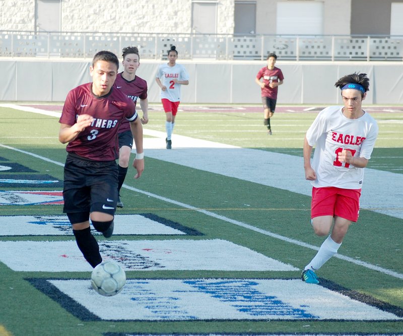 Graham Thomas/Siloam Sunday Siloam Springs senior Christian Marroquin runs with the ball down the near sideline during the first half of the Panthers' 8-0 win against Vilonia on Friday at Panther Stadium.