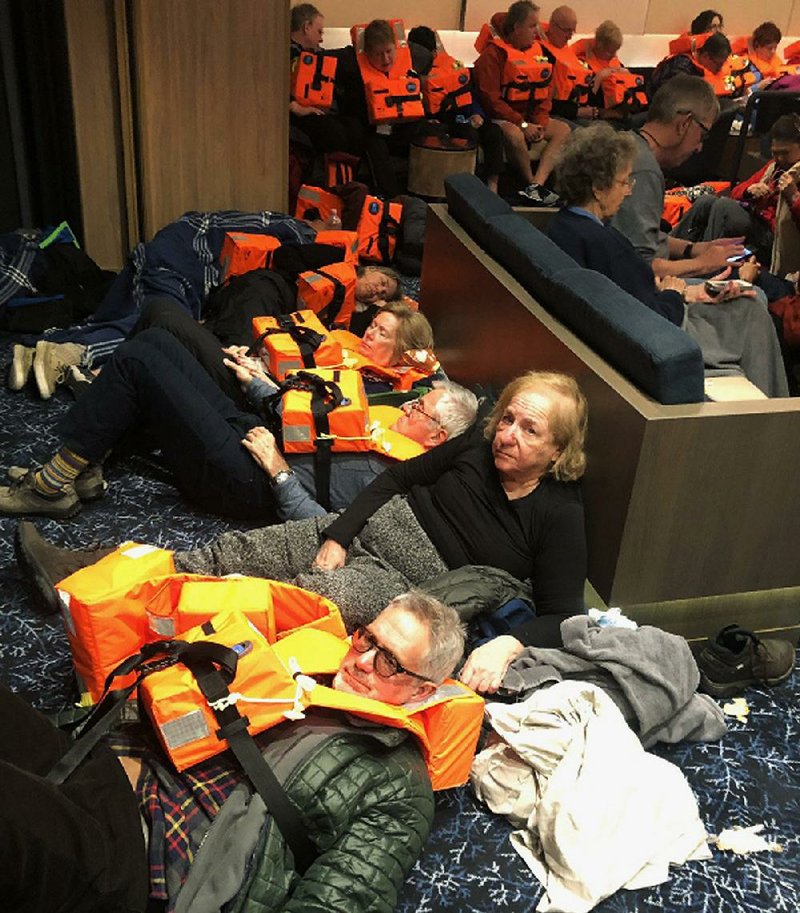 Passengers on the Viking Sky cruise ship wait to be evacuated last month. Rescue workers removed more than 1,300 passengers and crew members from the disabled ship, including several Arkansans.