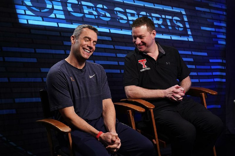 Virginia Coach Tony Bennett (left) and Texas Tech Coach Chris Beard share a laugh before an interview for CBS Sports Network’s We Need to Talk on Sunday in Minneapolis.