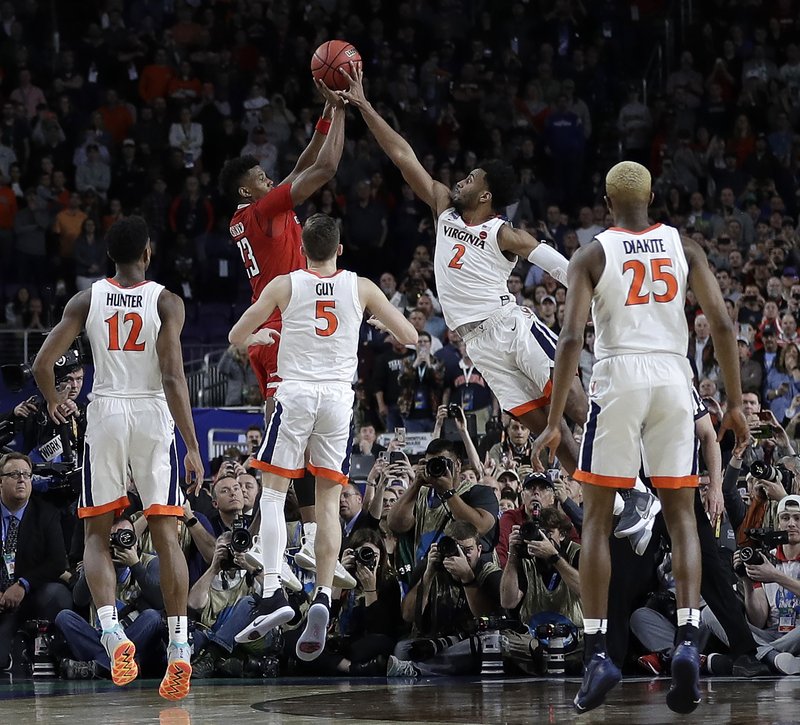Virginia's Braxton Key (2) blocks a shot by Texas Tech's Jarrett Culver (23) during the second half in the championship of the Final Four NCAA college basketball tournament, Monday, April 8, 2019, in Minneapolis. (AP Photo/David J. Phillip)

