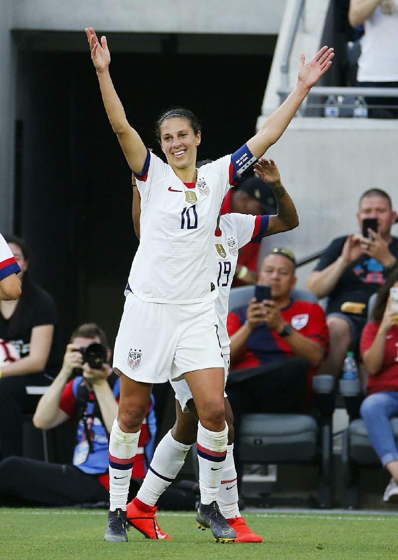 U.S. forward Carli Lloyd celebrates her second goal during an international friendly between the United States and Belgium on Sunday in Los Angeles. She also had an assist to help lead the U.S. to a 6-0 victory.