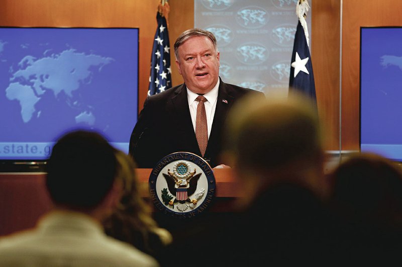 The Associated Press ANNOUNCEMENT: Secretary of State Mike Pompeo speaks at a news conference to announce the Trump administration's plan to designate Iran's Revolutionary Guard a "foreign terrorist organization," Monday, at the U.S. State Department in Washington.