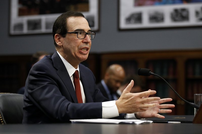 Treasury Secretary Steven Mnuchin testifies before a House Appropriations subcommittee, Tuesday, April 9, 2019, on Capitol Hill in Washington. Mnuchin said Tuesday that his department intends to "follow the law" and is reviewing a request by a top House Democrat to provide President Donald Trump's tax returns to lawmakers. (AP Photo/Patrick Semansky)

