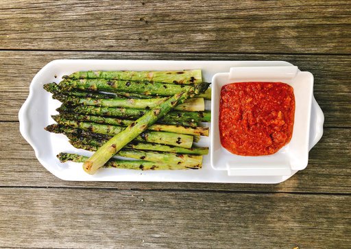 Grilled Asparagus with Romesco Sauce Photo by Elizabeth Karmel via AP