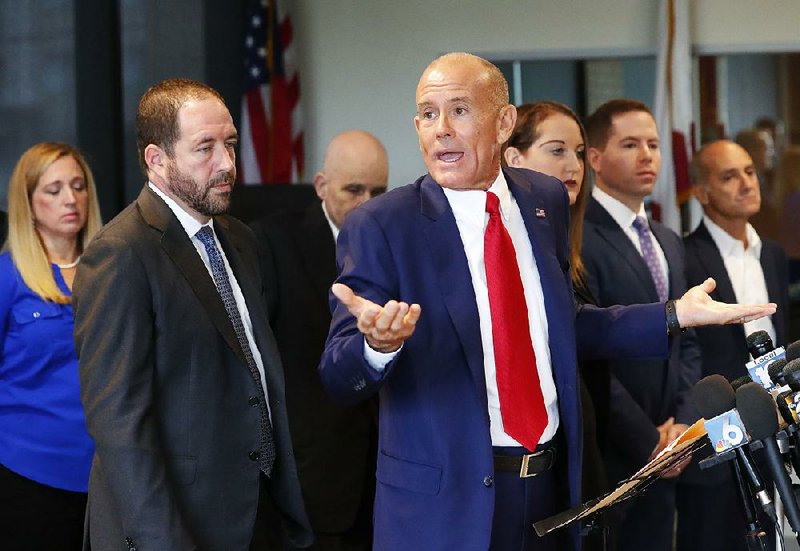 Bob Kelley, an attorney involved in lawsuits filed over a promised settlement in the Parkland, Fla., school shooting, speaks Wednesday at a news conference in Fort Lauderdale.