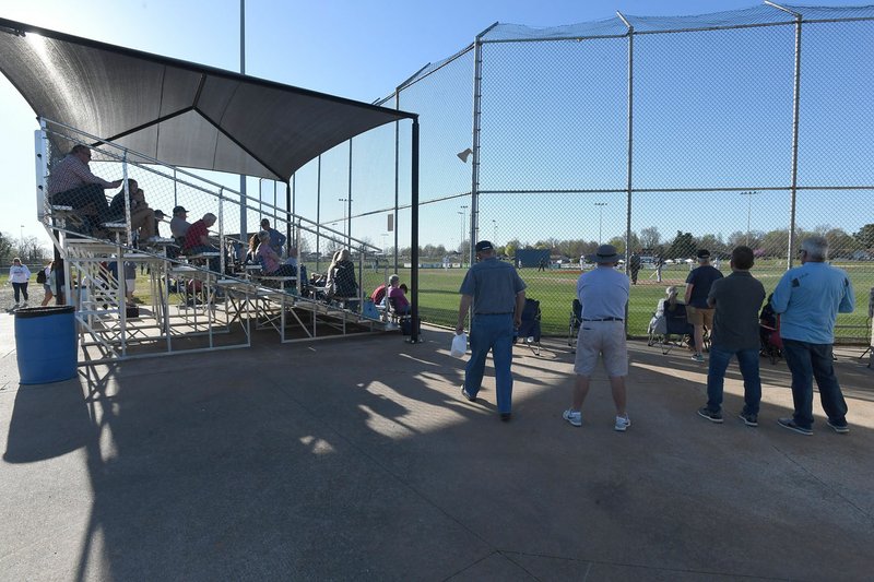 NWA Democrat-Gazette/J.T. WAMPLER Fans watch Har-Ber High School take on Bentonville West on Monday at Randall Tyson Recreational Complex in Springdale. The Tyson Complex has been the home for the Har-Ber and Springdale High baseball teams, but both will have their own fields on the high school campuses next season.