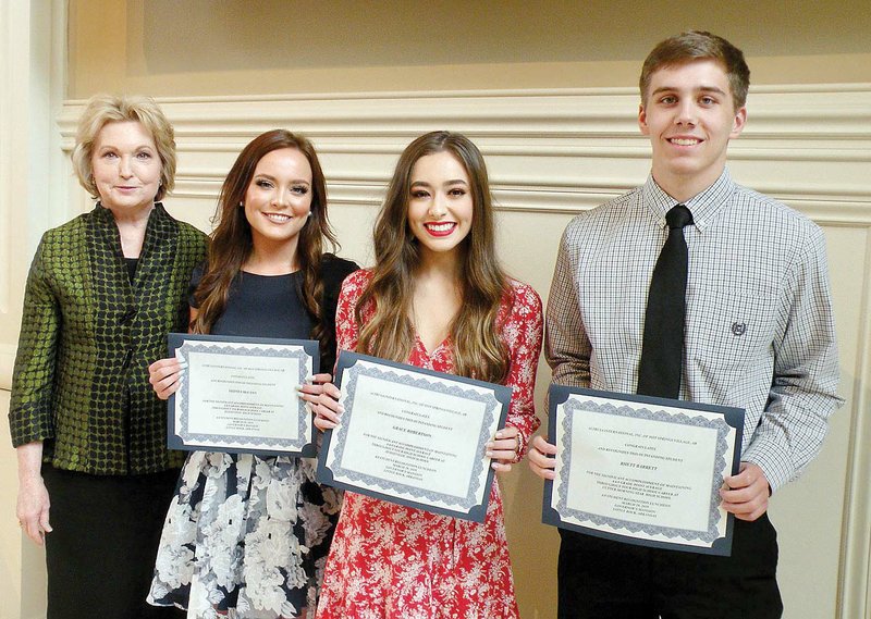 Arkansas first lady Susan Hutchinson, left, congratulated three Garland County high school seniors who each received a $500 scholarship from Altrusa International of Hot Springs Village, AR, Inc. during the 4.0 GPA Students Recognition and Scholarship Luncheon on March 29 at the Arkansas Governor’s Mansion. The students are Sidney McCann, second from left, and Grace Robertson, both from Jessieville High School, and Rhett Barrett of Cutter Morning Star High School.