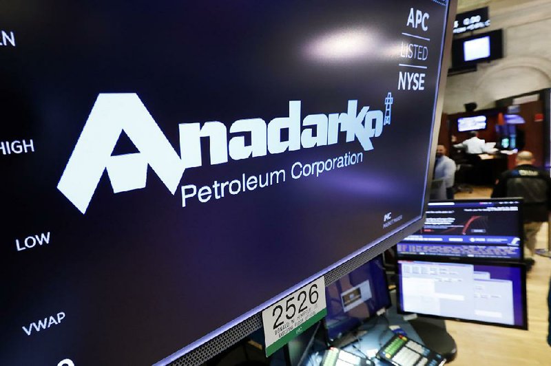 Shares of Anadarko Petroleum Corp., whose  logo appears above a  trading post at  the New York Stock Exchange on Friday, rose 32 percent after Chevron announced it would pay $33 billion to buy the rival oil company. 
