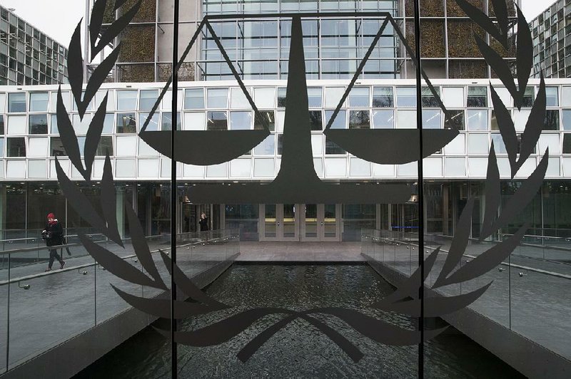 A person leaves the International Criminal Court in The Hague, Netherlands, earlier this year. Judges rejected a request by the court’s prosecutor to open an investigation into war crimes and crimes against humanity in Afghanistan and alleged crimes by U.S. forces linked to the conflict. 