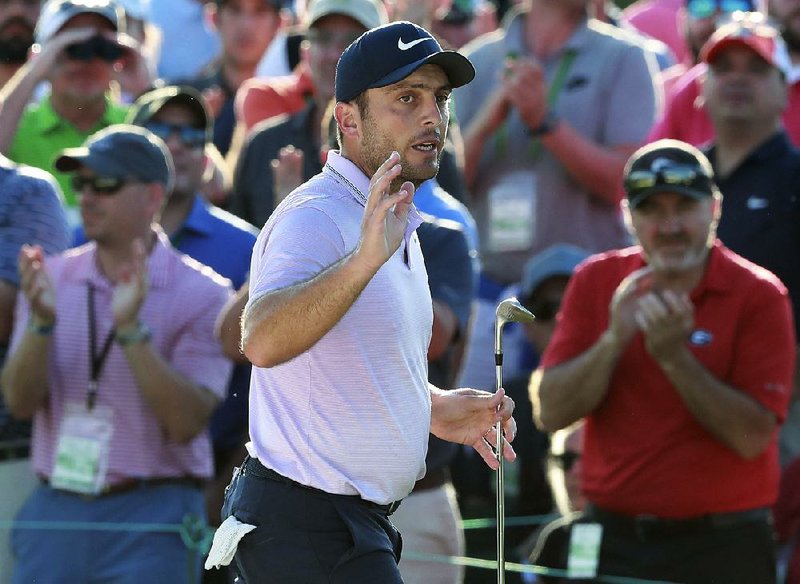 Francesco Molinari of Italy shot a 6-under 66 at the Masters on Saturday and holds a two-stroke lead over Tiger Woods and Tony Finau entering today’s final round.