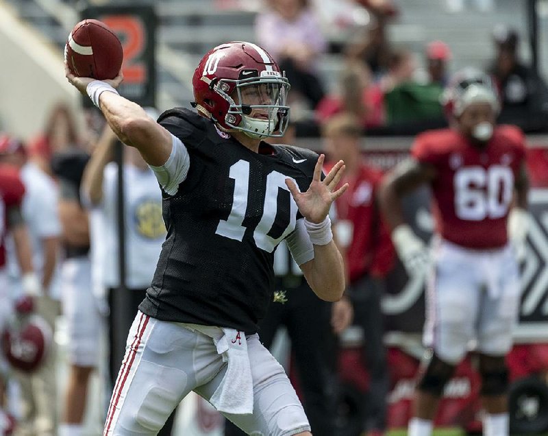 Alabama quarterback Mac Jones throws during the second half of Saturday’s spring game in Tuscaloosa, Ala. Jones, a third-teamer last season, went 19 of 23 for 271 yards with 2 touchdowns and an interception Saturday. 