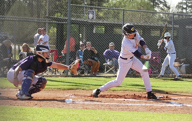 The Sentinel-Record/Jami Smith TAKING A SWING: Fountain Lake sophomore Bryce Brownlee takes a swing against Booneville in Friday's game in Hot Springs Village.