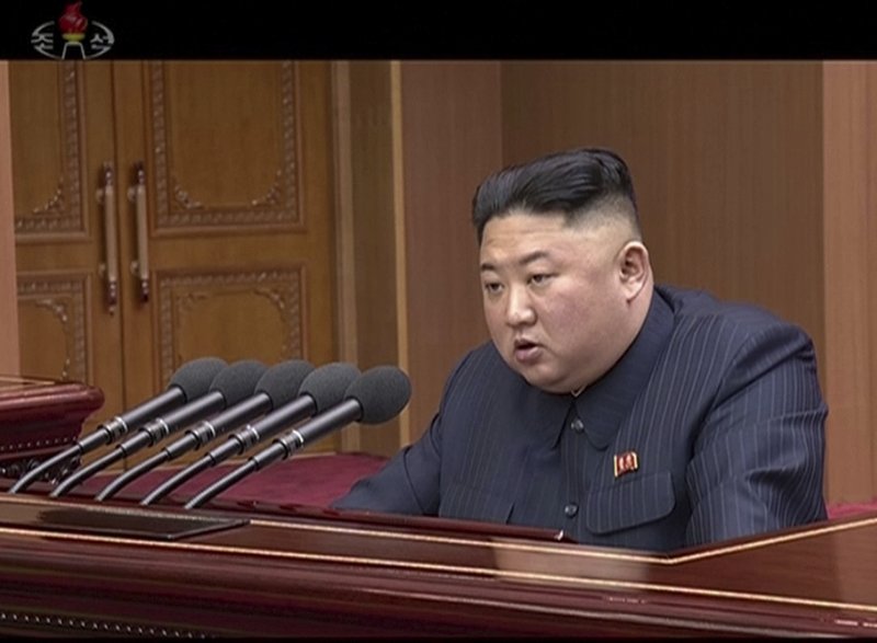 In this image made from a video taken on Friday, April 12, 2019, by North Korean broadcaster KRT, North Korean leader Kim Jong Un delivers his speech at parliament in Pyongyang, North Korea. Kim said he is open to a third summit with President Donald Trump, but set the year's end as a deadline for Washington to offer mutually acceptable terms for an agreement to salvage the high-stakes nuclear diplomacy, the state-run media said Saturday. (KRT via AP)