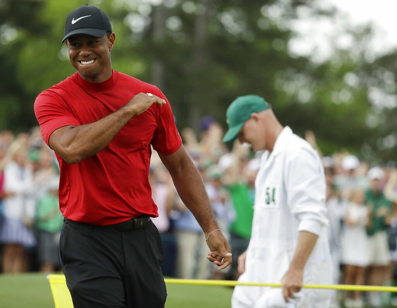 Tiger Woods reacts as he wins the Masters golf tournament Sunday, April 14, 2019, in Augusta, Ga. 

