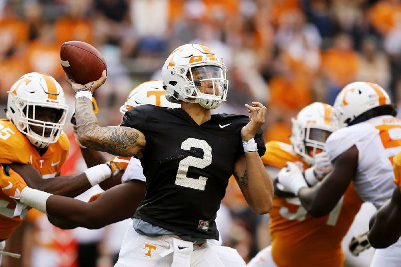 Tennessee is looking for a breakthrough season from quarterback Jarrett Guarantano (2). Tennessee hired former assistant Jim Chaney as its offensive coordinator to help Guarantano who has a 6-12 career record as a starter.