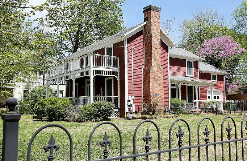 The Wade-Heerwagen House at 338 N. Washington Ave. is shown Friday in the Washington-Willow neighborhood in Fayetteville. 