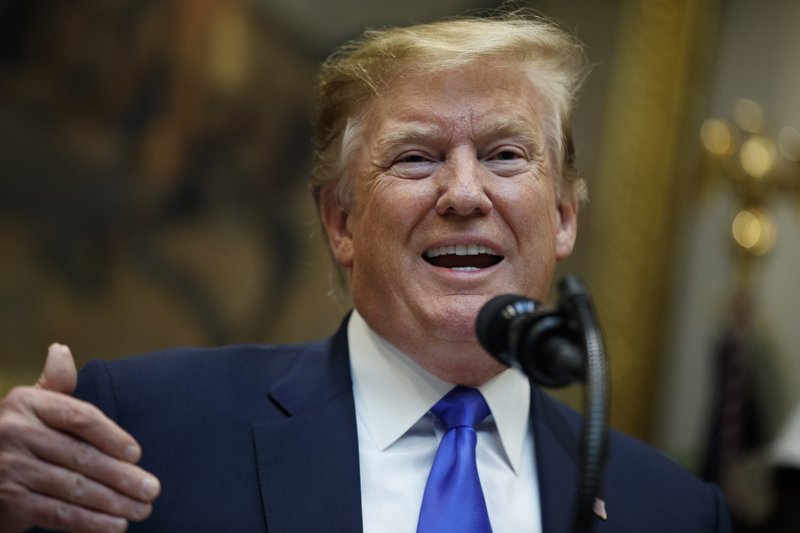 President Donald Trump gestures as he speaks about the deployment of 5G technology in the United States during an event in the Roosevelt Room of the White House, Friday, April 12, 2019, in Washington. (AP Photo/Evan Vucci)