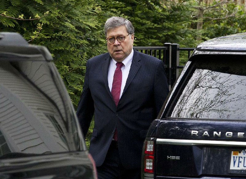 Attorney General William Barr leaves his home Monday in McLean, Va.