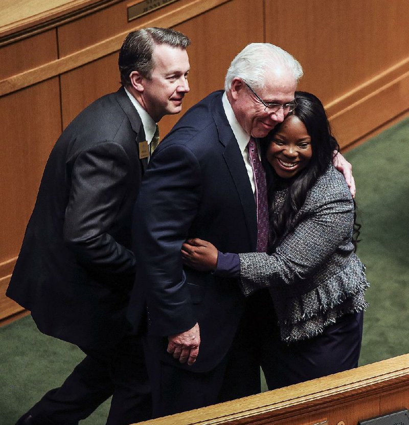 Arkansas Democrat-Gazette/MITCHELL PE MASILUN -- 4/10/2019 -- State Representatives, from left, Carlton Wing, Jon Eubanks and Jamie Scott gather for a photo on the House floor at the end of the 92nd General Assembly at the State Capitol Wednesday, April 10, 2019 in Little Rock.†
