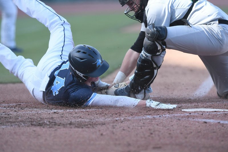 NWA Democrat-Gazette/J.T. WAMPLER Springdale Har-Ber's Mason Wood gets caught at home plate by Van Buren's Dakota Peters Monday April 15, 2019 at Arvest Ballpark in Springdale. Har-Ber won 2-1.