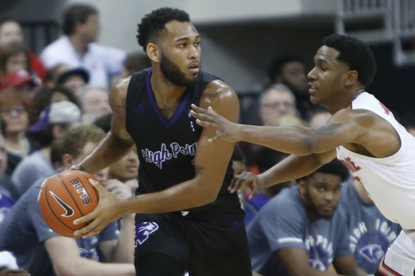 High Point's Jahaad Proctor, left, looks for an open pass against Ohio State's C.J. Jackson during the second half of an NCAA college basketball game Saturday, Dec. 29, 2018, in Columbus, Ohio. (AP Photo/Jay LaPrete)

