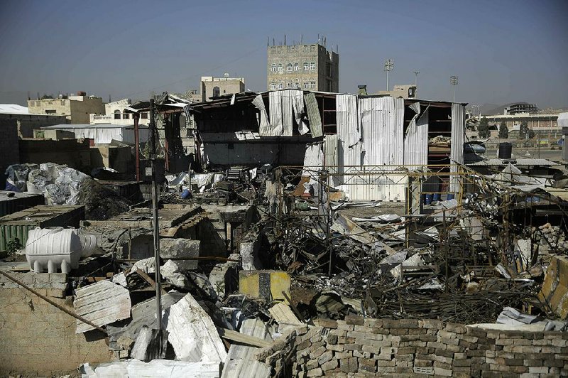 A Saudi-led coalition airstrike reduced this area of Sanaa, Yemen, to rubble as seen in this photo taken last Wednesday. The U.S. provides billions of dollars in arms to the coalition fighting Iran-backed rebels in Yemen. 