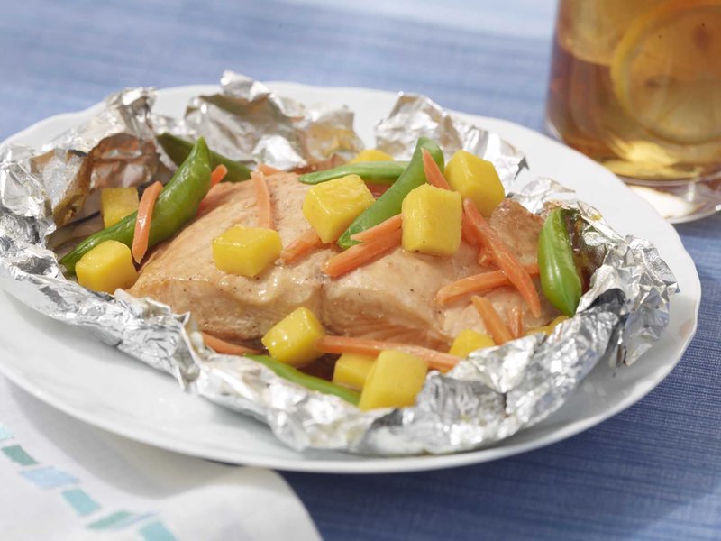 Salmon in Foil Packets With Mangoes, Carrots and Peas
Courtesy of the National Mango Board