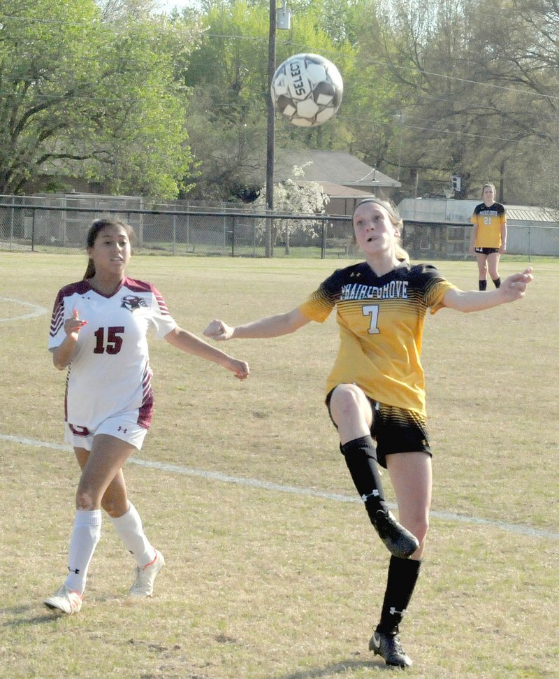 MARK HUMPHREY ENTERPRISE-LEADER/Prairie Grove freshman Ashley Clark, shown competing against Gentry when she scored a goal, helped the Lady Tigers earn their first win over Shiloh Christian in girls soccer action on Friday, April 5.