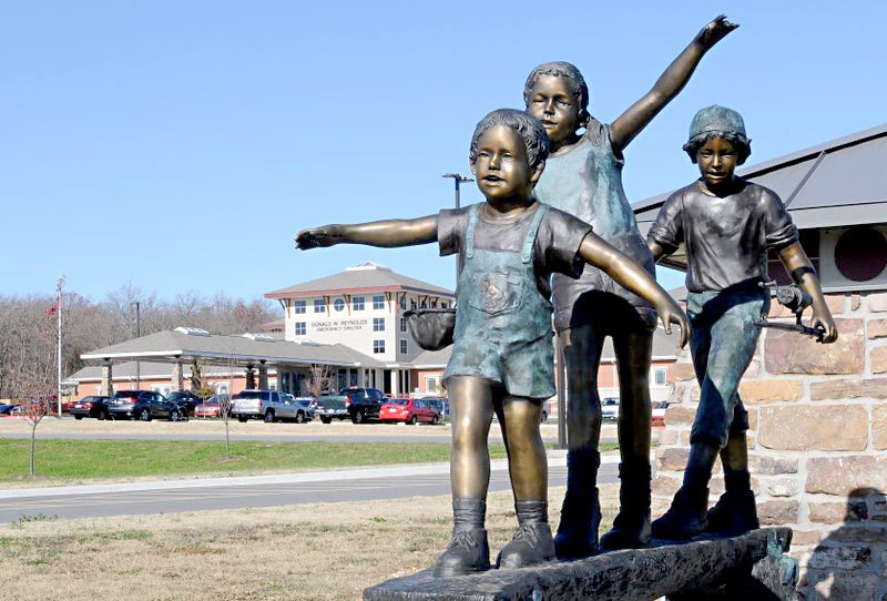 NWADG/SAMANTHA BAKER A sculpture in front of the Northwest Arkansas Children's Shelter.