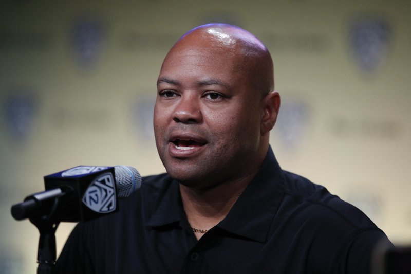 In this July 25, 2018, file photo, Stanford head coach David Shaw speaks at the Pac-12 Conference NCAA college football Media Day in Los Angeles. The NCAA's Division I Council meets this week in Indianapolis, and it is expected to vote by Friday, April 19, 2019, on an amendment to the rules regarding graduate transfers and financial aid.  (AP Photo/Jae C. Hong, File)