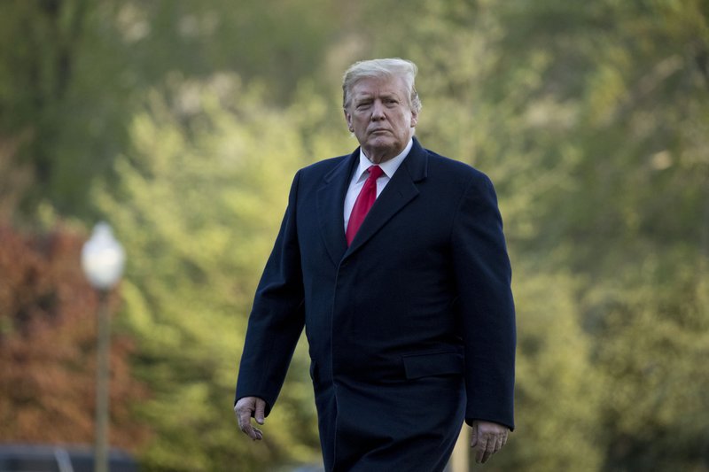 President Donald Trump walks on the South Lawn as he arrives at the White House in Washington, Monday, April 15, 2019, after visiting Minnesota. (AP Photo/Andrew Harnik)