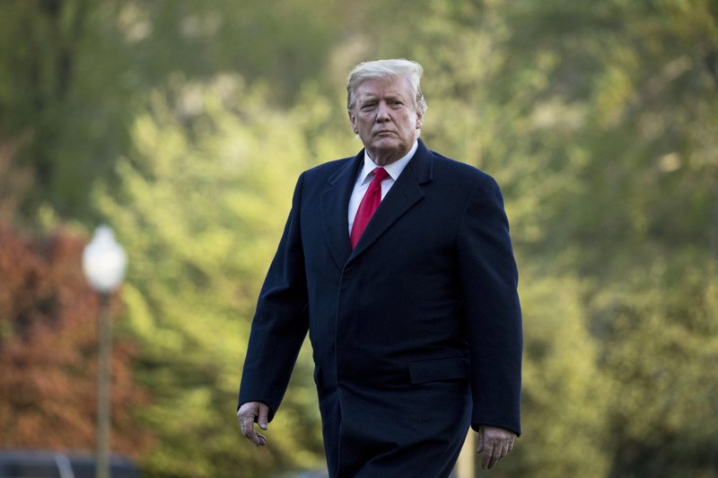 FILE - In this April 15, 2019, file photo, President Donald Trump walks on the South Lawn as he arrives at the White House in Washington. (AP Photo/Andrew Harnik, File)