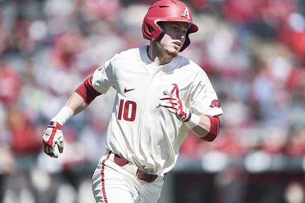 Arkansas designated hitter Matt Goodheart runs toward first base during a game against Ole Miss on Sunday, March 31, 2019, in Fayetteville. 