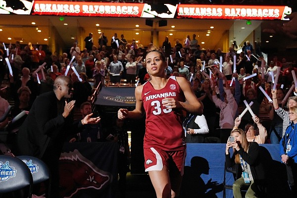 Arkansas' Chelsea Dungee enters the court prior to an NCAA college basketball championship game in the Southeastern Conference women's tournament, Sunday, March 10, 2019, in Greenville, S.C. (AP Photo/Richard Shiro)