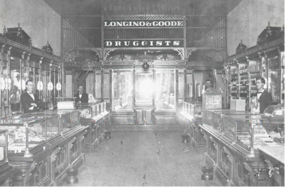 An archival press photo shows the interior of the former Longino & Goode Drug Store in downtown Magnolia. 