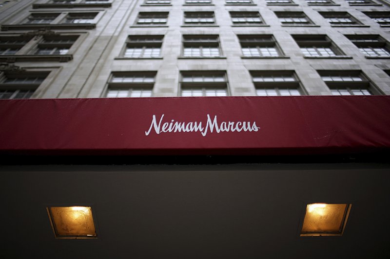  This March, 11, 2009, file photo, shows the Neiman Marcus store in Dallas. Neiman Marcus Group is getting serious about the fast growing secondhand luxury business. The Dallas-based luxury retailer said Wednesday, April 17, 2019, that it has acquired a minority stake in Fashionphile LLC, an online seller of preowned accessories. (AP Photo/Tom Pennington, File)