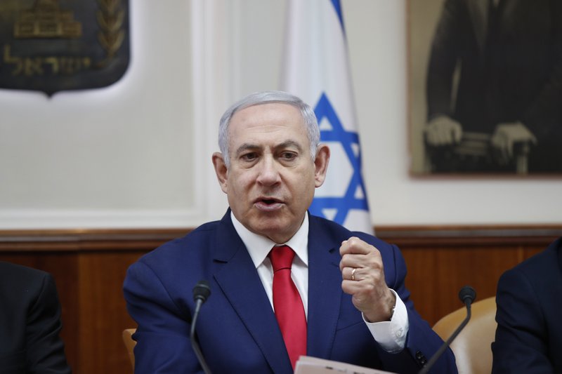 Israeli Prime Minister Benjamin Netanyahu chairs the weekly cabinet meeting in Jerusalem, Sunday, April 14, 2019. (Ronen Zvulun/Pool via AP)