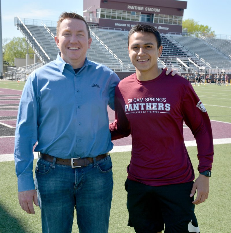 Jimmy Allen (left) with Siloam Springs' Christian Marroquin.
