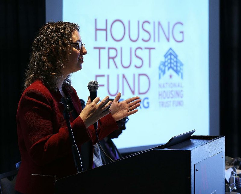 Diane Yentel, president and CEO of the National Low-Income Housing Alliance, talks Thursday about the need for more housing for low-income people during the Arkansas Fair Housing/Fair Lending Conference in Little Rock. 