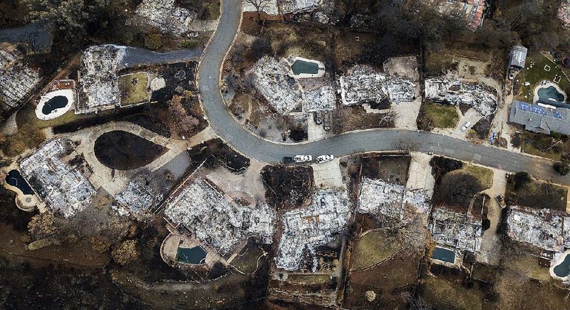 These homes in Paradise, Calif., shown Dec. 3, were leveled by the wildfire that swept through the area in November. The prevalence of benzene in the town’s drinking water is “jaw-dropping,” Dan Newton with the state’s Water Resources Control Board said. 