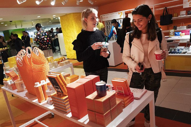 Shoppers browse at a store in New York on April 10. Retail sales in March showed strong growth, rising the most since September 2017, while jobless claims fell to the lowest number since September 1969. 