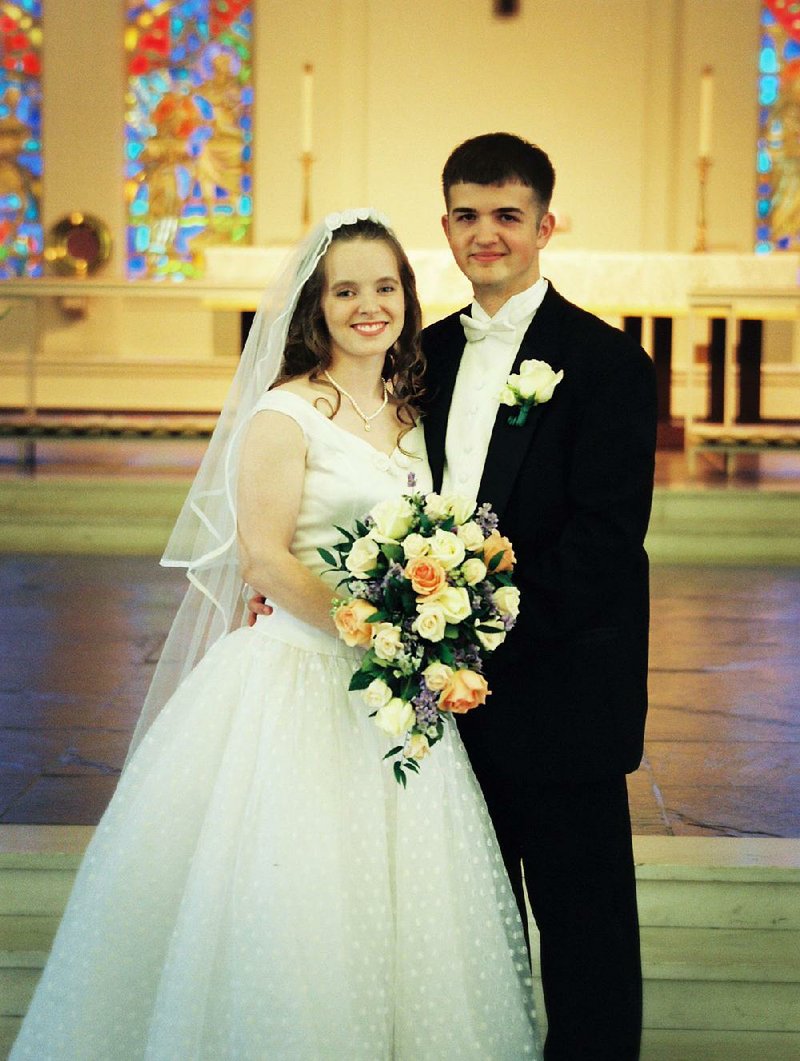 Noelle Mitchell and John Scuderi were married on May 29, 1999. They met seven years earlier, when she was 12 and he was 15, and they were close friends for six years before they started dat- ing. “I did not know that he was going to ask me to date him when he did, but it did feel right,” Noelle says. “He was my person.”