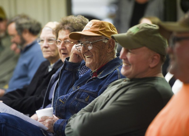 NWA Democrat-Gazette/CHARLIE KAIJO Dale Quinton of Strickler reacts Thursday as he's acknowledged during a public meeting at the Strickler Fire Department community center in Fayetteville. Quinton helped with digging at the Southwest Experimental Fast Oxide Reactor site.