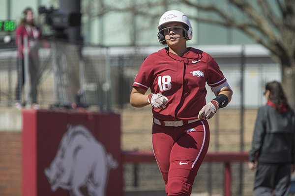 Arkansas' Ashley Diaz runs the bases after hitting a home run during a game against South Carolina on Sunday, March 17, 2019, in Fayetteville. 
