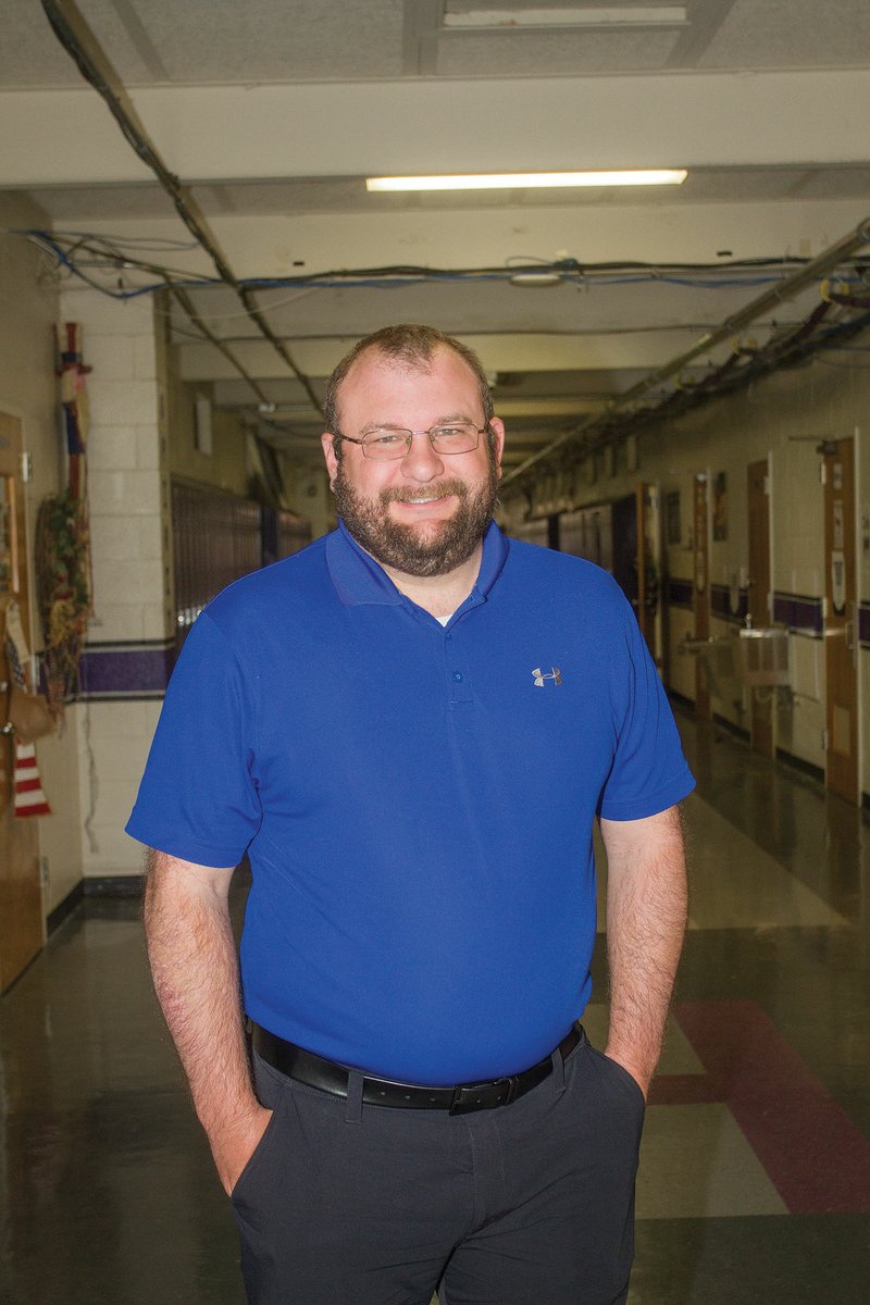 Clint Williams, standing in the hallway at Hazen High School, was recently hired as the new principal at Bald Knob High School. Williams has been the Hazen principal the past two years. He got his start in education during the 2011-12 school year as a seventh-grade math teacher at Hazen.